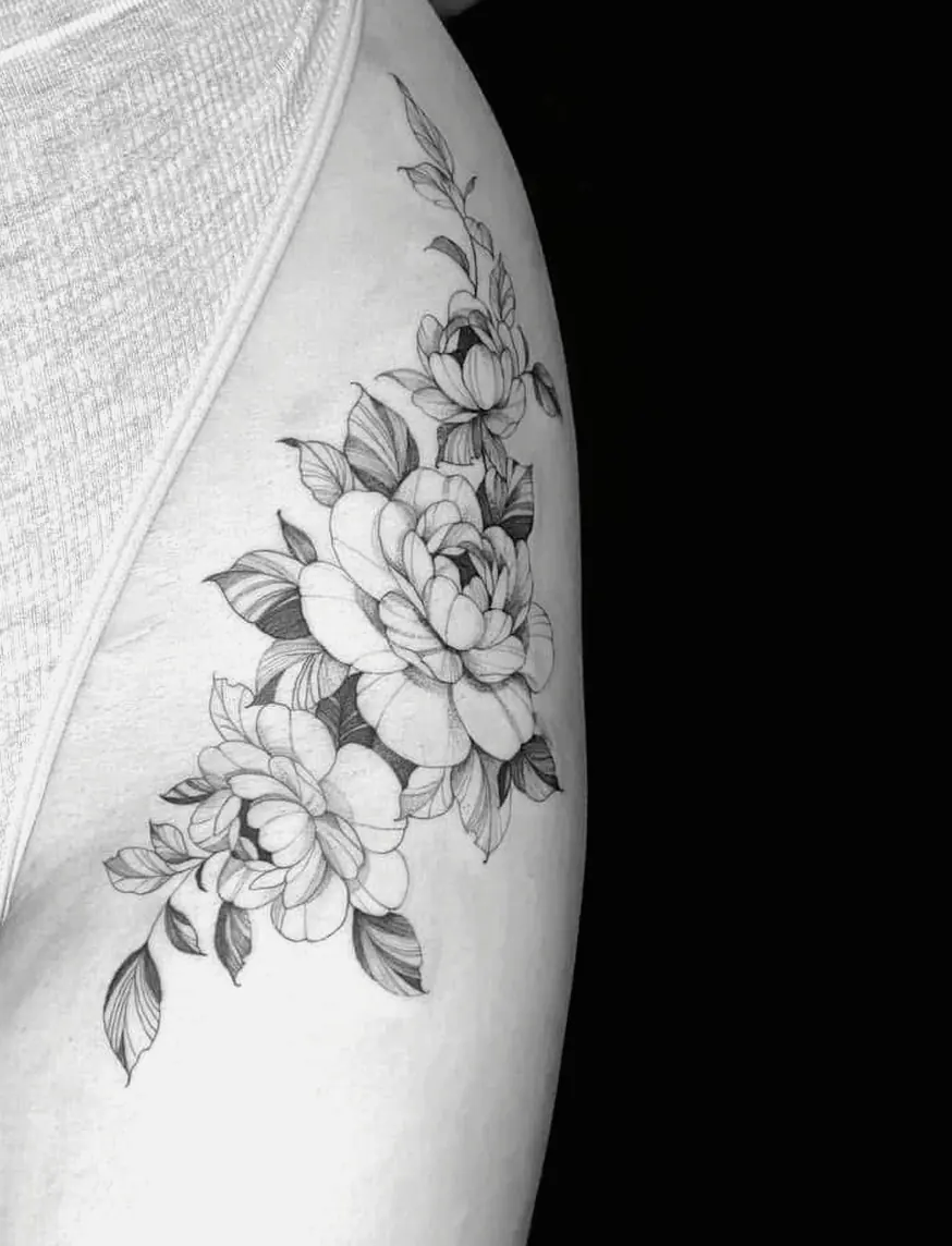 Black and grey peonies with buds and leaves running along the hip and side.
